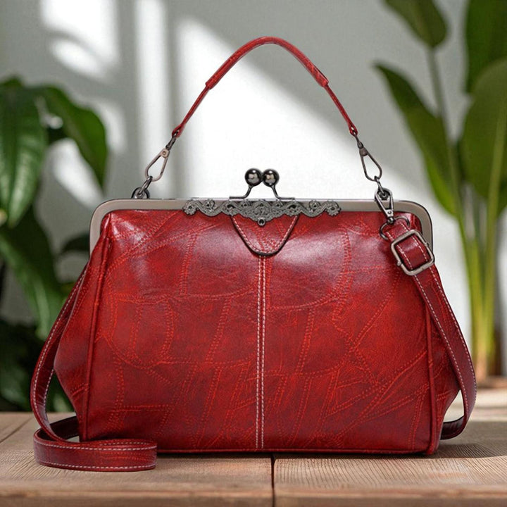 Vintage handbag with clasp closure