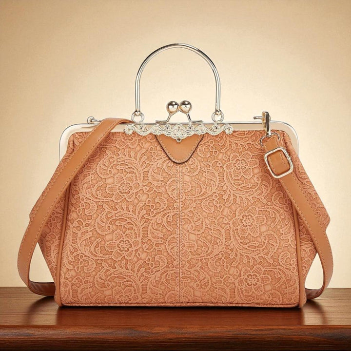 Vintage handbag with clasp closure