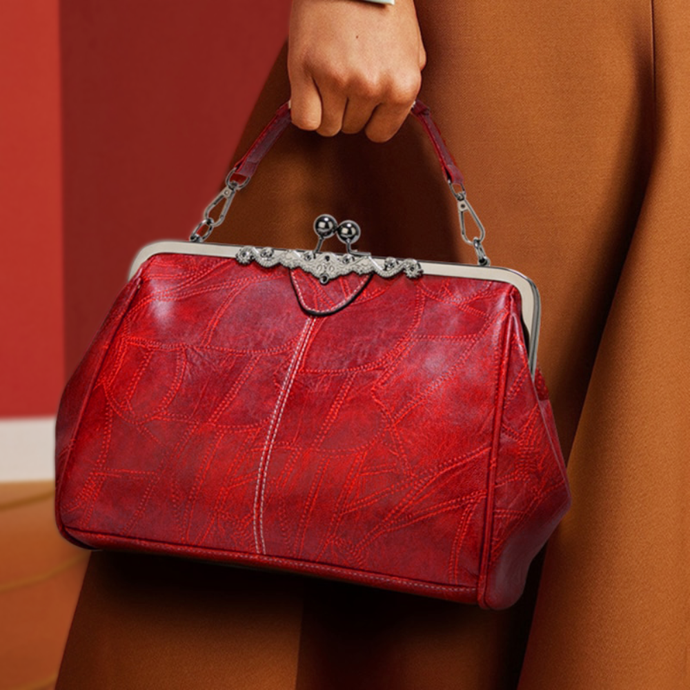 Vintage handbag with clasp closure