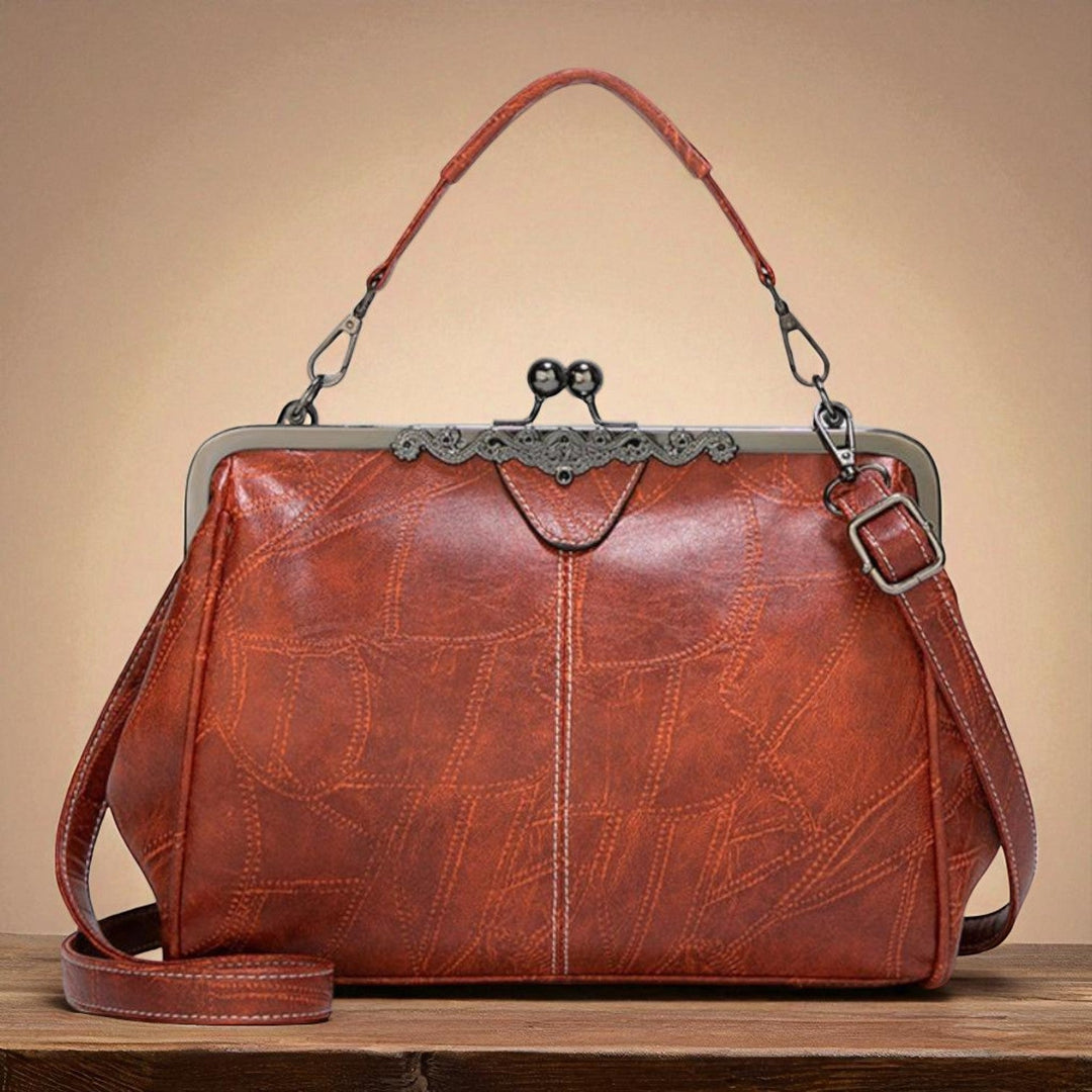 Vintage handbag with clasp closure