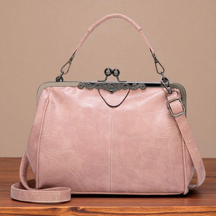 Vintage handbag with clasp closure